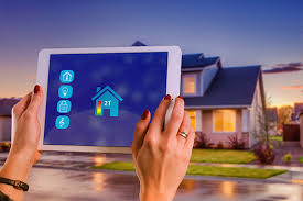 Smart thermostat wall-mounted control panel showing temperature display and climate control options in a modern home