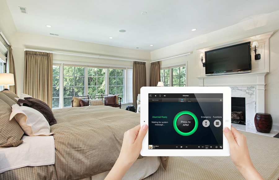 Tablet controlling home security system in a bedroom